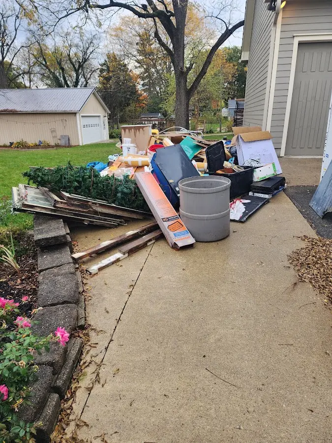 Dumpster being loaded with debris for Residential Dumpster Rental in Port Angeles East